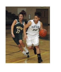 Bonney Lake’s Tiara Killmer pushes the ball up the floor during Saturday’s victory over Clover Park.