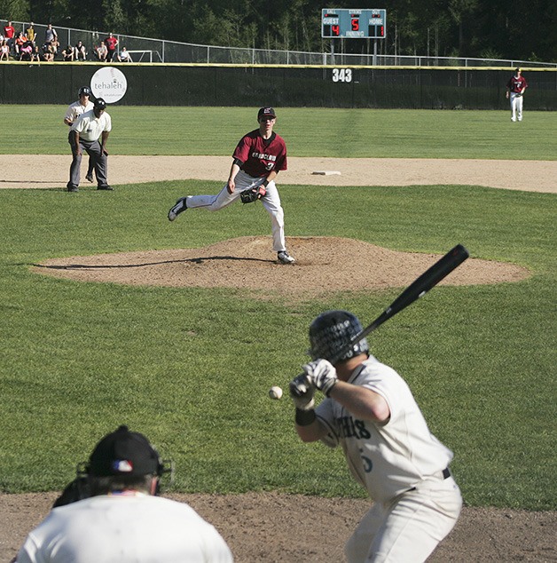 Enumclaw Hornet Tyler St. John throws to a Bonney Lake batter May 1. Enumclaw won 9-4.