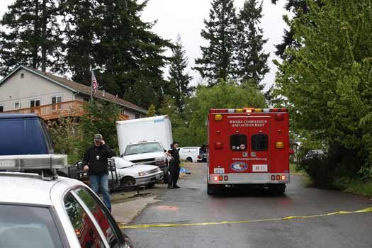 Police and fire investigate a death after a body was found in a burning truck.