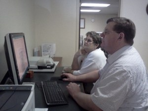 Caroline Harkness and Jim Johnson search for her family's 1940 enumeration district in the Census records.