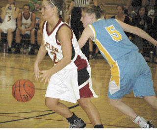 Hazen’s defense kept on Enumclaw’s Mara Koplitz Friday night. The Hornets came away with a 44-42 loss.