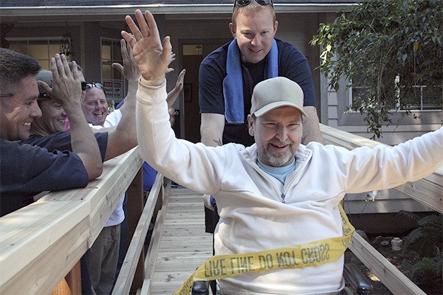 Claude Wirkus is pushed by Hunter Chumbley down the ramp for the first time.