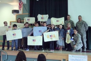 Dana Davenport's class poses with Senior Airman Joshua Hitesman