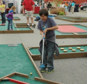 The Enumclaw Rotary mini golf course was a big hit at the Street Fair Friday.