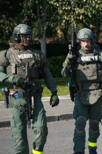 The King County SWAT team ran training hostage/hostile situations inside the empty Del's Farm Supply building in Enumclaw on Oct. 1. The team also trained with surveillance equipment like remote-controlled cameras and practiced breaching buildings with explosives.