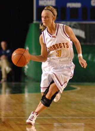 White River's Kristine Brons brings the ball up court Wednesday night in the Hornets' win over Seattle Prep.