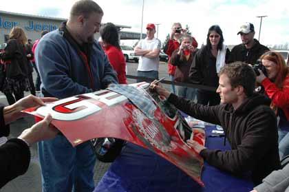 NASCAR Sprint Cup driver Kasey Kahne came home to Enumclaw to sign autographs for fans.