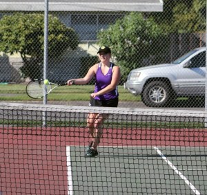 Spartan McKayla Medley returns a serve during Sumner High's match against district rival Bonney Lake.