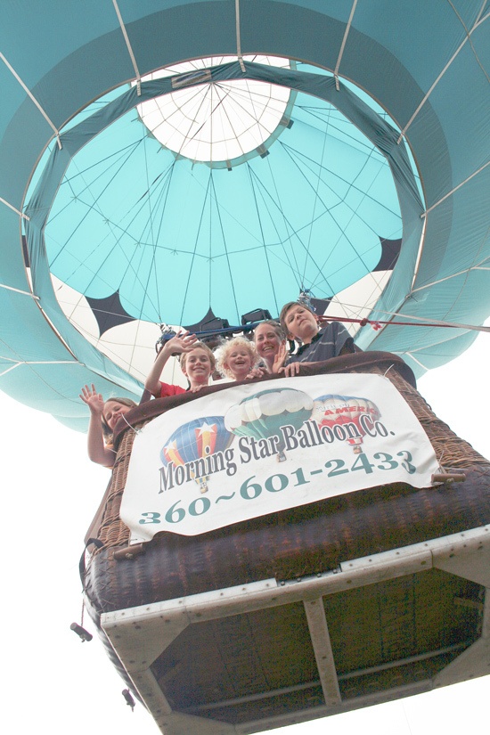 Tatum and Indiana Atwood celebrated their birthdays at the 2015 Miners Day festival by flying in a hot air balloon with friends and family. Photo by Ray Still.