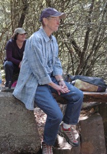 Lin Thrune-Makela takes a break at the top of Mount Peak