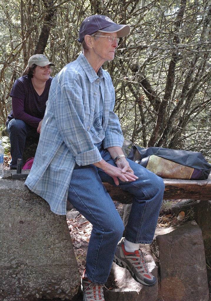Lin Thrune-Makela takes a break at the top of Mount Peak