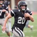 Jason Day finds plenty of running room during Saturday&rsquo;s victory over Mercer Island. The Bonney Lake junior set records rushing touchdowns and eight total TDs. Photo by Vince Miller.