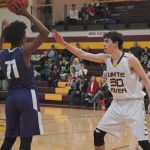 White River senoir Alex Wallen pressures Foster&rsquo;s Jamari Severson during the Hornets&rsquo; Friday night rout of the Bulldogs. Wallen posted a game-high 20 points. Photo by Kevin Hanson.