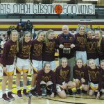 Chris Gibson with the White River High School&rsquo;s girls basketball team. Photo by Kevin Hanson.