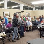 Black Diamond City Council meetings continue to be a spectator sport, with the audience often making comments to the council or, in this case, standing to show opposition to the majority council. Photo by Ray Still.