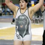 Bonney Lake junior Sam Peterson raises his arms after winning the 220-pound state title Saturday at the Mat Classic in the Tacoma Dome. Peterson&rsquo;s win secured the team championship for the Panthers in the 3A division. Photo by Dennis Box.