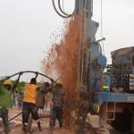 During their first year in Rialo, Jane Matson and Paul Clark and other travelers watched a well being drilled in the village. Photo courtesy of Jane Matson.
