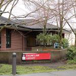 The Enumclaw police suggested the library remove this short, concrete wall and the seating area it encloses, because its intended use has been redirected to a concealed area for fights, drug use, drinking, loitering and sleeping. Photo by Ray Still.