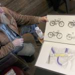 Rick Gilmore, a Puyallup resident, works on motorcycle sketches and art, as well as tattoos. His work will be featured in the upcoming Bonney Lake Artists Reception on April 21. Photo by Bailey Jo Josie