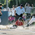 A controversial play at the plate decided the district championship. Here, the umpire rules that Yelm&rsquo;s Ally Choate beats the tag of Bonney Lake catcher Hailee Hagins. Photo by Dennis Box.
