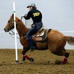 Enumclaw&rsquo;s Emma Schmidt on the way to a district record in pole bending. Contributed photo.