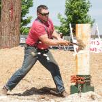 Dan Huizenga takes his turn in the standing block chop. Photo by Alicia Britschgi