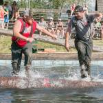 Darryl Dunford and Jake Frick compete in log rolling. Photo by Alicia Britschgi