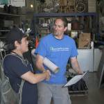 EHS student Joseph Landon thanks Jesse Streck for working with him at Enumclaw Recyclers. Photo by Ray Still