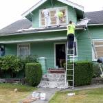 Professional painters and volunteers from Big Change Recovery Homes spent a week painting Angie Keaty&rsquo;s home a bright green. Keaty is the co-founder of Battlefield Addiction, a local non-profit support group for families of drug addicts. Battlefield Addiction often partners with Big Change Recovery. Photo by Ray Still