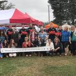 The Puget Sound Doberman Pinscher Club donated six Fido Bags to the Enumclaw Fire Department. Contributed photo