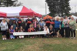 Firefighters accept donation of canine-saving equipment