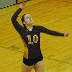 Hope Baldyga launches a serve against the Selah Vikings during last year&rsquo;s Class 2A state tournament. File photo by Kevin Hanson