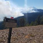 The Norse Peak Fire as seen from the Cougar Valley trail head. Courtesy photo