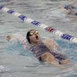 Olivia Castro starts the second half of her lap during the district 200 yard medley event. Her relay team, also consisting of Mikaela Miele, Marin Wilson and Emma Huynh, placed sixth in the event and will compete at state. Photo by Ray Still