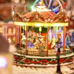 The holiday village is lively with many moving parts, including a carousel, ski lift, ferris wheel, popcorn factory, the Polar Express train and even several people around the village. Photo by Ray Still