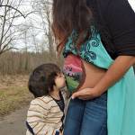 Belly painting was another activity the Burts did with Samsara while she was still in the womb. The image painted on Laxs belly is a family of five birds on a branch, with another bird flying in to join them. Submitted photo