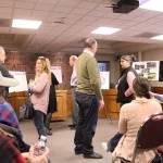 A small group of Enumclaw residents attended the March 14 open house for the citys future dog park, which was hosted by Enumclaws Park Board. Photo by Ray Still