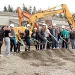 The BLHS Chamber Choir, who performed at the start of the groundbreaking, joined Jadin Bassett, Bryce Gaskill and other students to officially break ground for the Bonney Lake Performing Arts Center. Photo by Ray Still