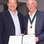 Scott Gray (right) was presented with the Martin Luther King Jr. Medal of Distinguished Service by County Councilman Reagan Dunn. KING COUNTY PHOTO