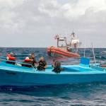 The crew of the Coast Guard cutter Active, a 210-foot medium endurance Reliance-class cutter homeported in Port Angeles, interdicts more than 1 ton of cocaine from four suspected drug smugglers during a counter-narcotics patrol in the eastern Pacific Ocean on May 18. (U.S. Coast Guard)