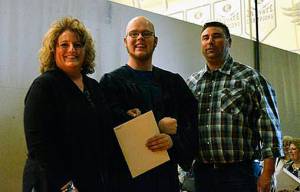 Nancy and JIm Babst with the Auburn Riverside High Schools Charles Cowan, the recipient of the Babst Memorial Scholarship. COURTESY PHOTO
