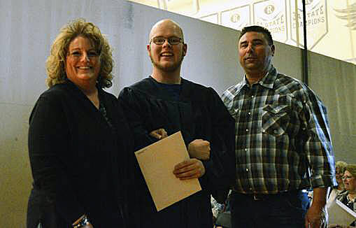 Nancy and JIm Babst with the Auburn Riverside High Schools Charles Cowan, the recipient of the Babst Memorial Scholarship. COURTESY PHOTO