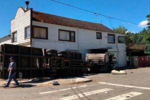 Dump truck crashes into Alderton store