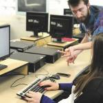 Students Kyle Hunt and Emma Anderson tackle a problem during a summer program for students in the White River School District. Submitted photo