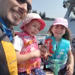 Rory Thayse took a ride with the Bonney Lake Police Department on their boat in Lake Tapps as part of her stint as Chief For A Day. On her left is her dad Nick, and her sister Noelle on the right. Submitted photo