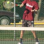 Brennan Gallagher returns serve during a 2017 match at Enumclaw High School. File image