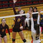 White Rivers Tori Schmidtke goes high for a kill during Friday action at the Class 2A state volleyball tournament. Photo by Kevin Hanson