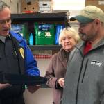 Homeless local hands Sumner Food Bank $17,000