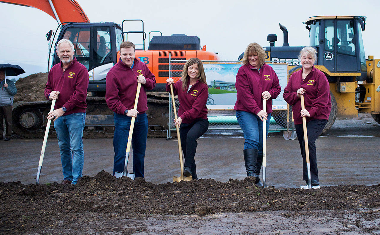 Taking part in last weeks groundbreaking ceremony were, from left: school board members Mike Jansen and Matt Scheer, District Superintendent Janel Keating, board member Karen Bunker and board president Denise Vogel. Photo courtesy Adam Leahy/White River School District