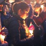 Hundreds gathered at the candlelight vigil on March 6 to honor Officer James Larsen and Zach Roundtree. Photo by Ray Miller-Still